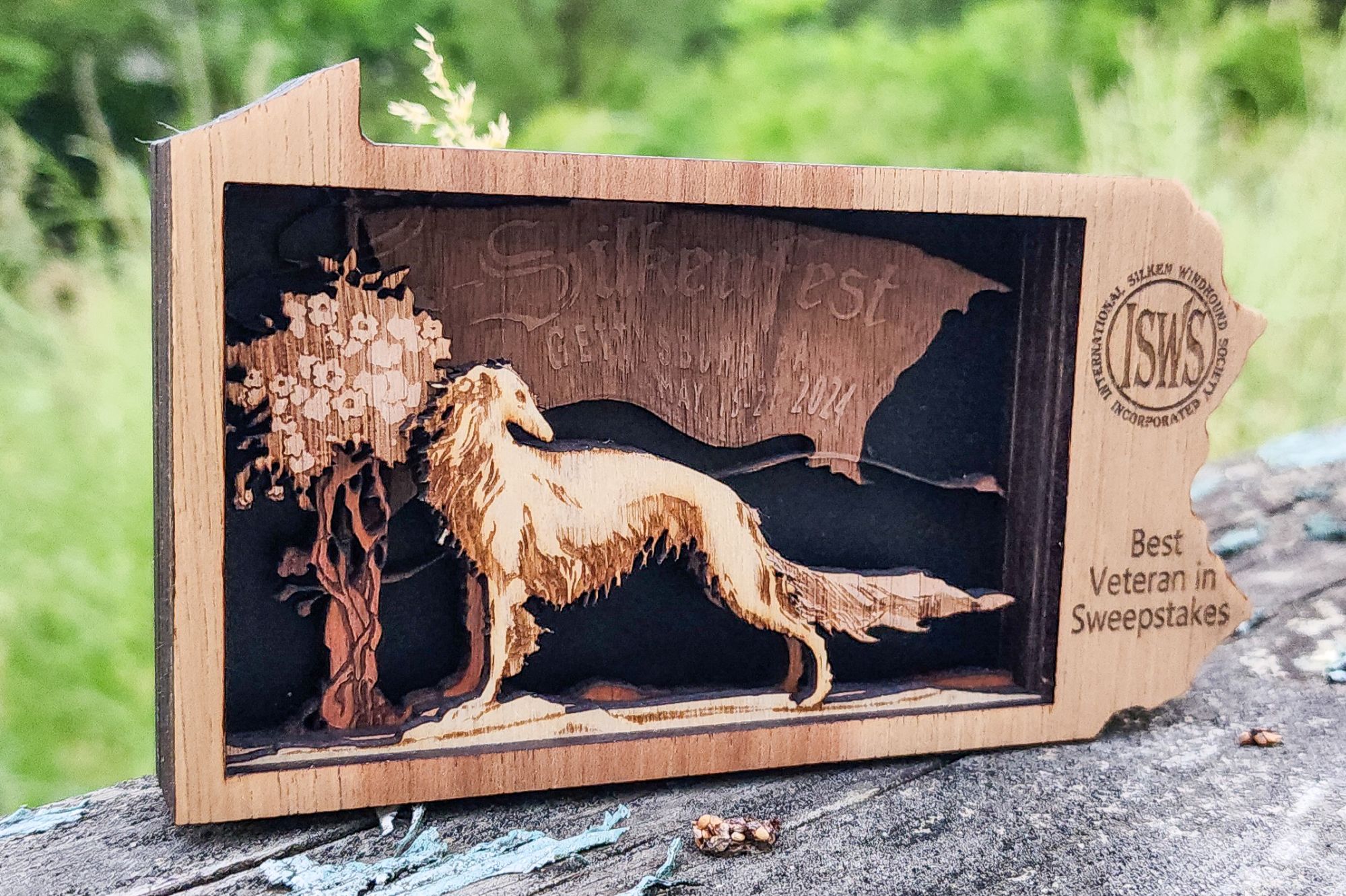 A laser cut and engraved layered piece made as a prize for the 2024 Silken Windhound breed nationals